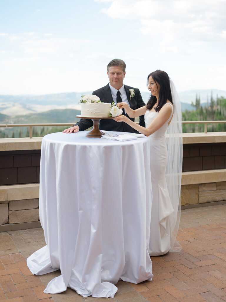 bride-groom-cake-cutting-park-city-wedding-planner