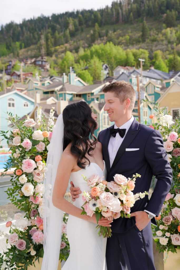 bride-groom-mountains-wedding-altar-peach-pink-vows