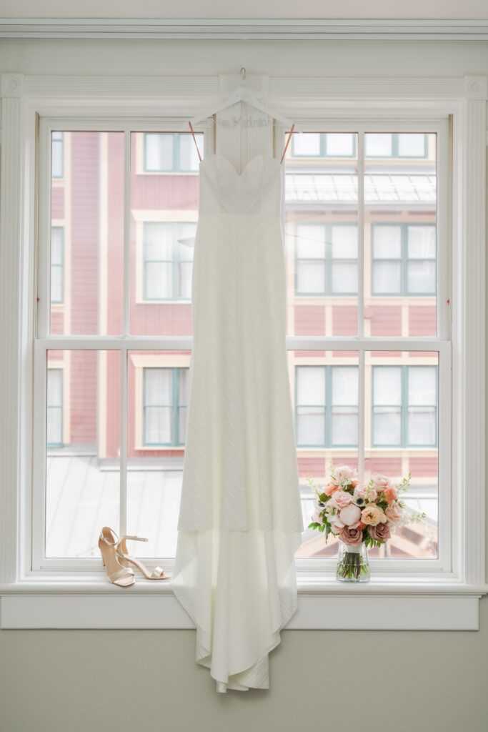 wedding-gown-bouquet-heels-shoes-window-white-pink-peach-detail-shot