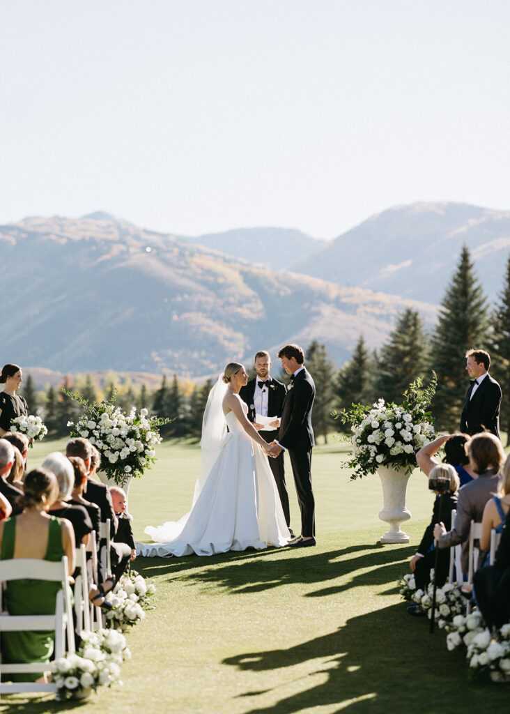 wedding-ceremony-aisle-flowers-vows-bride-groom-destination
