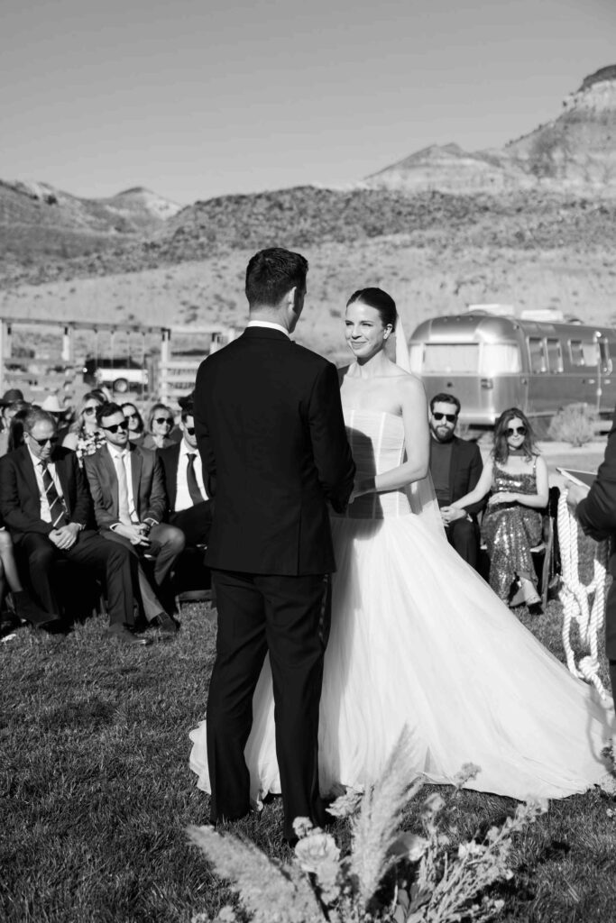 Black and white wedding photo of a bride and groom at AutoCamp Zion near Zion National Park, Utah.